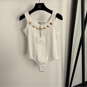 schiaparelli white sleeveless jumpsuit